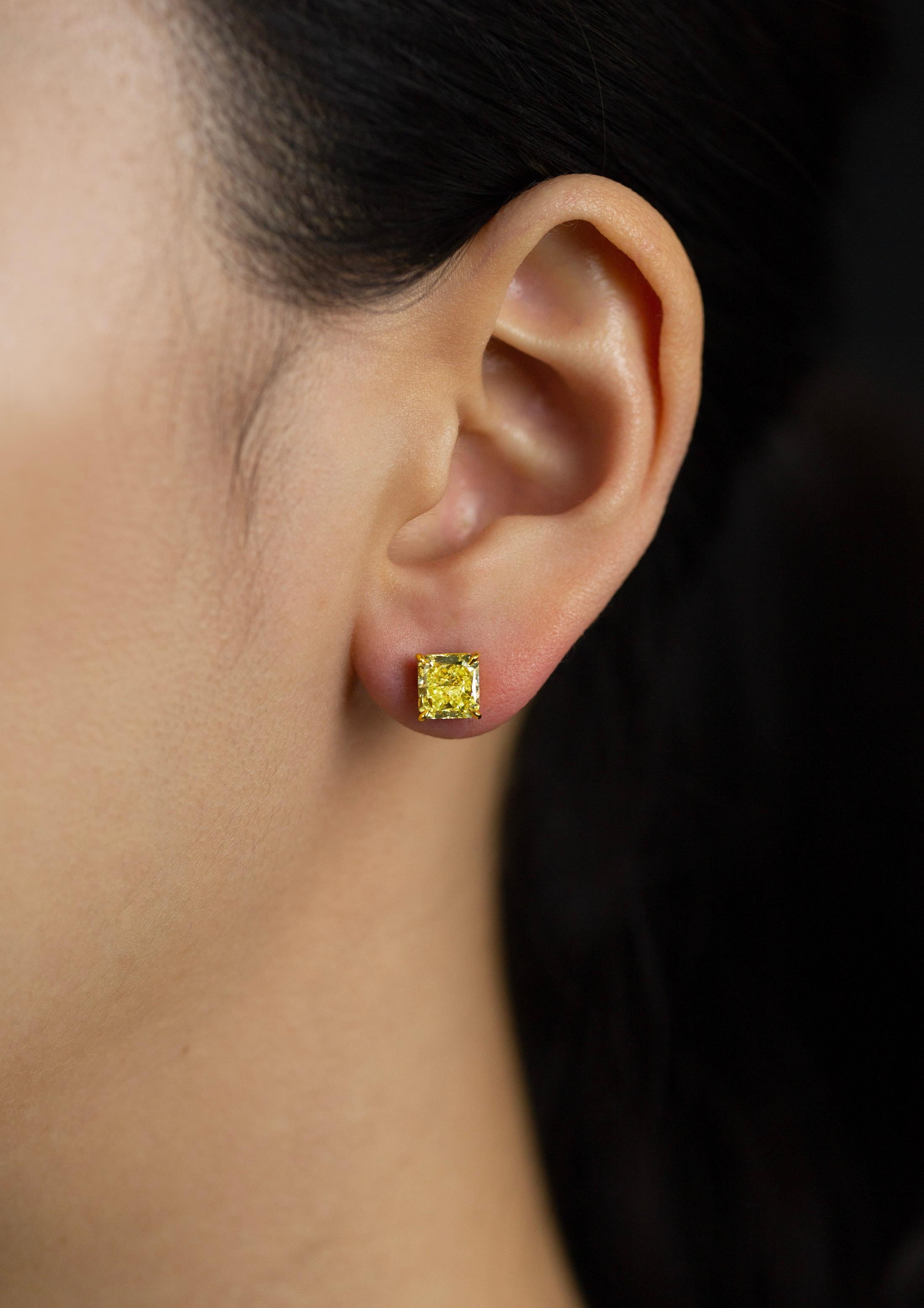 GIA Certified 2.74 Carats Radiant Cut Fancy Yellow Diamond Stud Earrings In New Condition For Sale In New York, NY