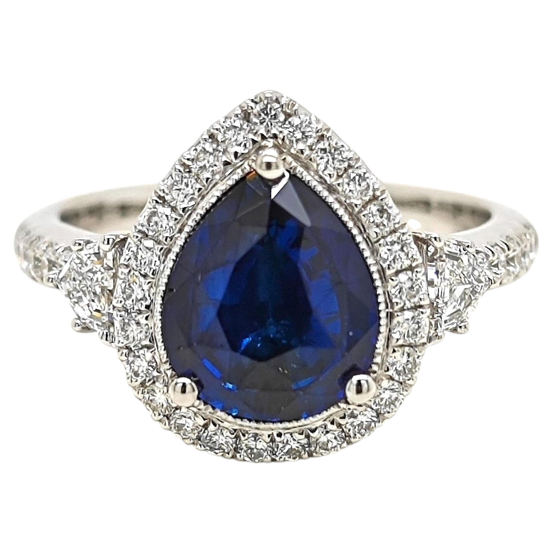 Bague en platine sertie d'un saphir de 2,75 carats certifié par le GIA et d'un diamant « Fancy »