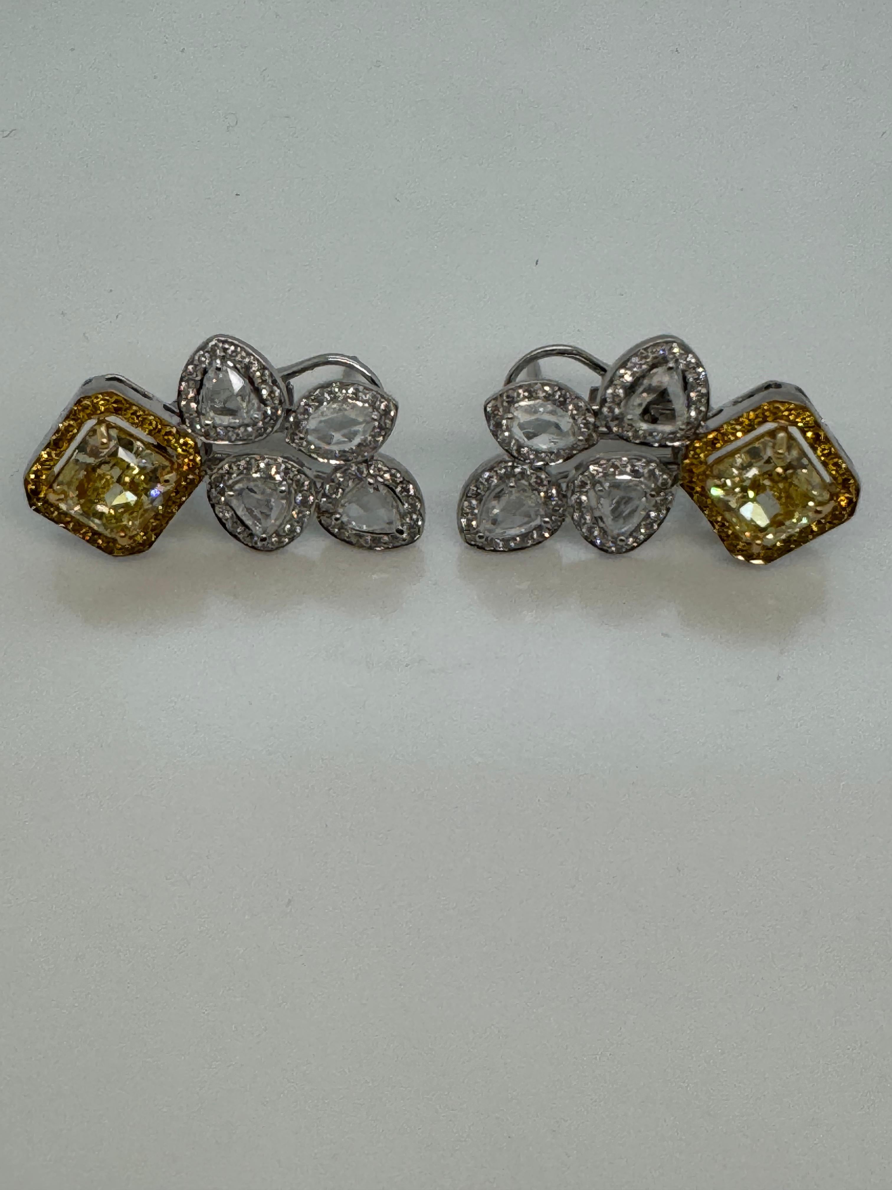 Cushion Cut GIA Certified 2.77 Carats Fancy Yellow Diamond Earrings in 18k White Gold For Sale