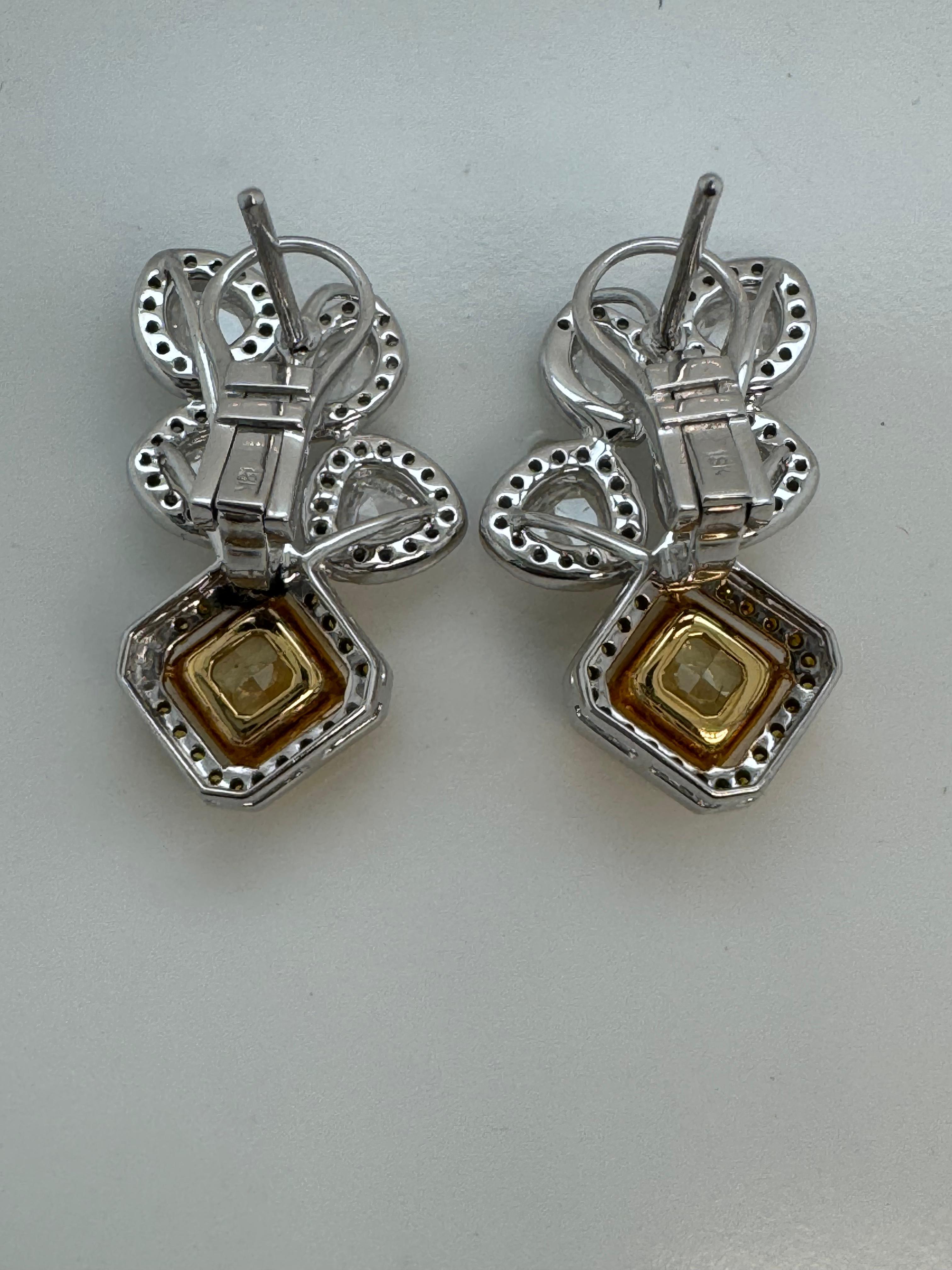 GIA Certified 2.77 Carats Fancy Yellow Diamond Earrings in 18k White Gold In New Condition For Sale In Bangkok, TH