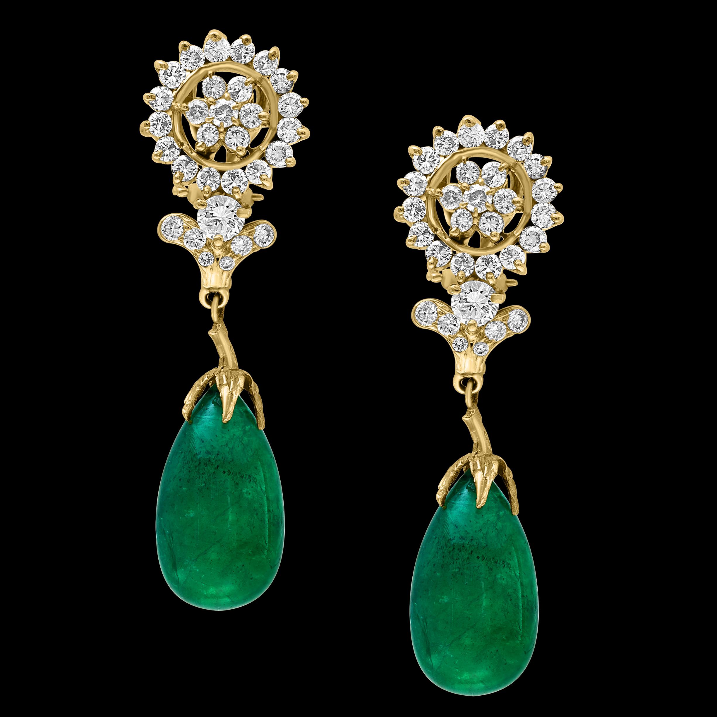 GIA Certified 28 Ct Emerald  Cabochon & Diamond Drops Hanging Earrings 14 KYG
This exquisite pair of earrings are beautifully crafted with 14 karat yellow gold  weighing 14 grams
Two fine  Cabochon Emerald   weighing approximately 14 carats each