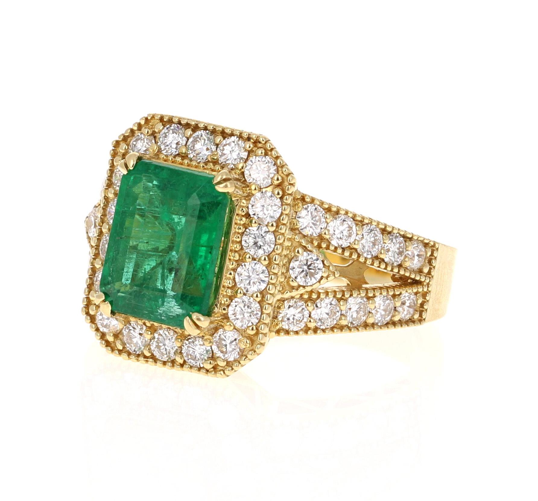 A beautiful, unique, Victorian-Inspired, 4.23 Carat Emerald and Diamond Ring in 18K Yellow Gold. 
The ring has been certified by GIA and the Cert # is: 5202859290
This gorgeous ring has a 2.85 Carat Emerald Cut Emerald that is set in the center of