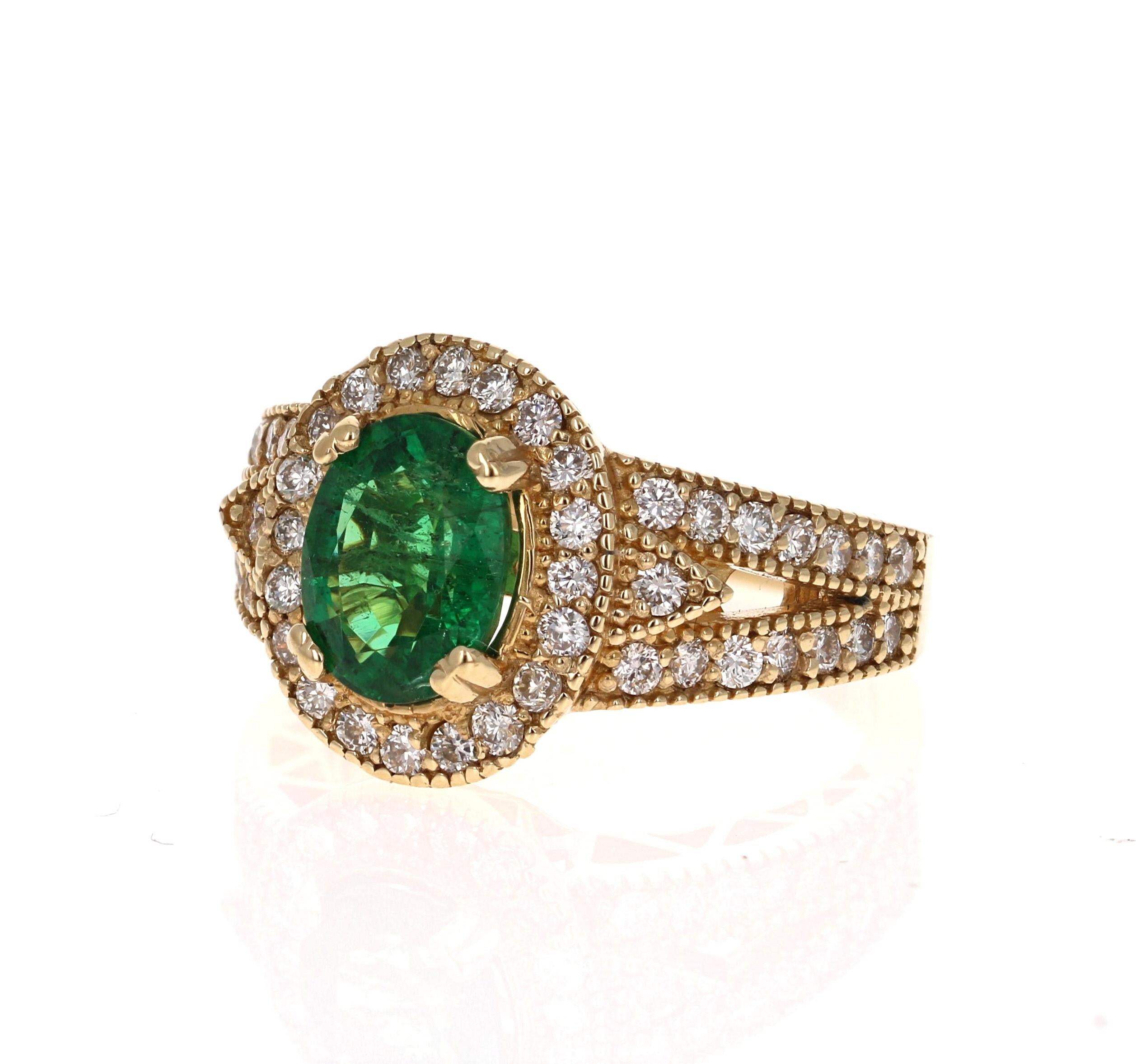 Stunning Vintage Inspired Oval Cut Emerald Diamond Ring! 

This Emerald ring is absolutely gorgeous. The center is an Oval cut Emerald which weighs 1.85 carats and is surrounded by 52 Round Cut Diamonds weighing 0.97 carats (Clarity: VS, Color: H).