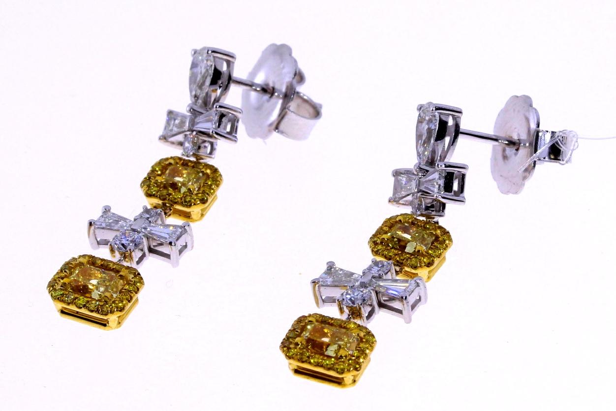 GIA Certified 2.84ct Fancy Yellow Radiant Dangle Diamond Earrings In New Condition For Sale In Los Angeles, CA