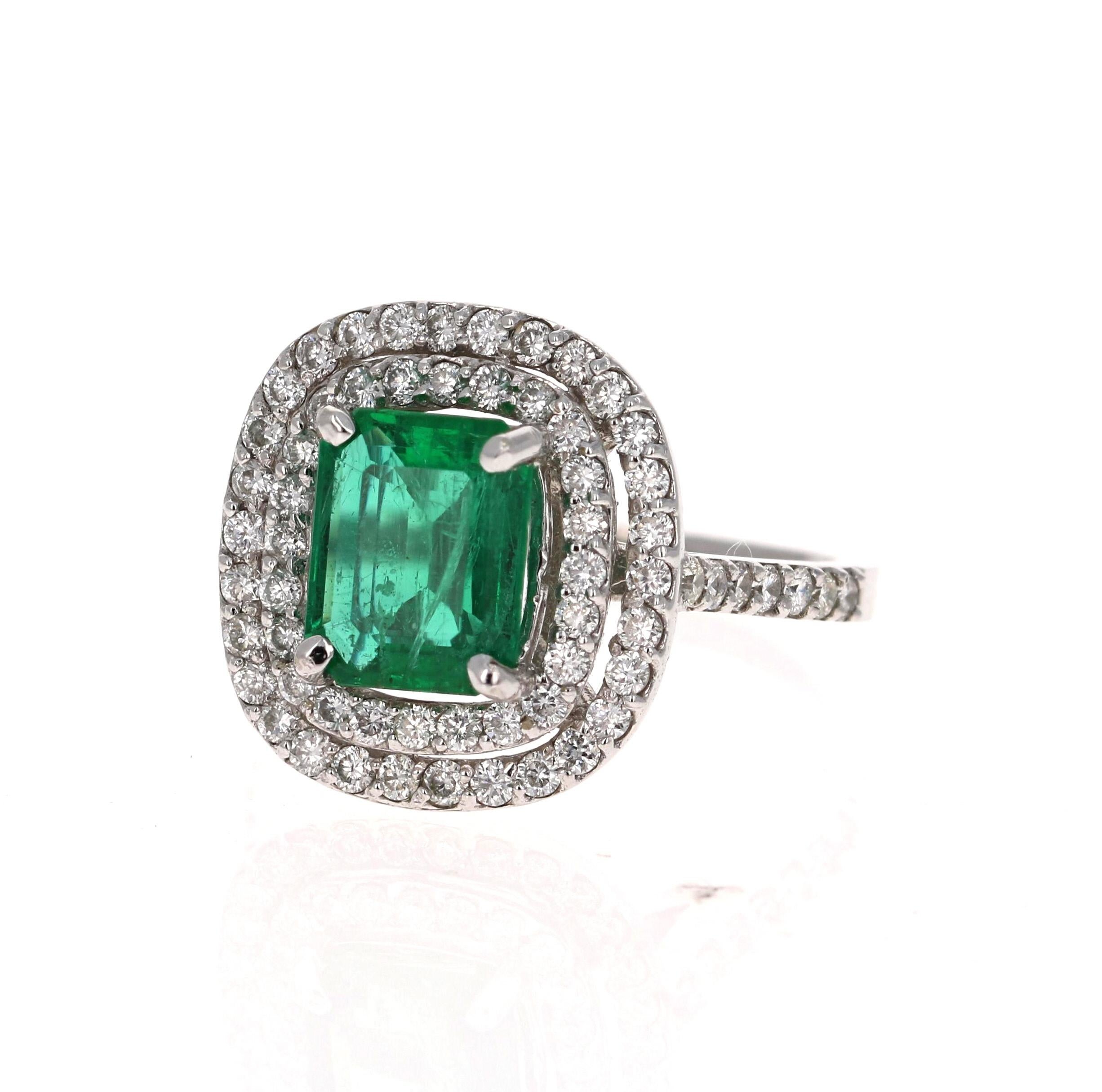 GIA Certified 2.86 Carat Emerald Diamond 14 Karat White Gold Engagement Ring

This Emerald ring is absolutely gorgeous. The center is an Emerald Cut Emerald which weighs 1.96 Carats and measures in at 9mm x 7mm.  The Emerald is surrounded by 68