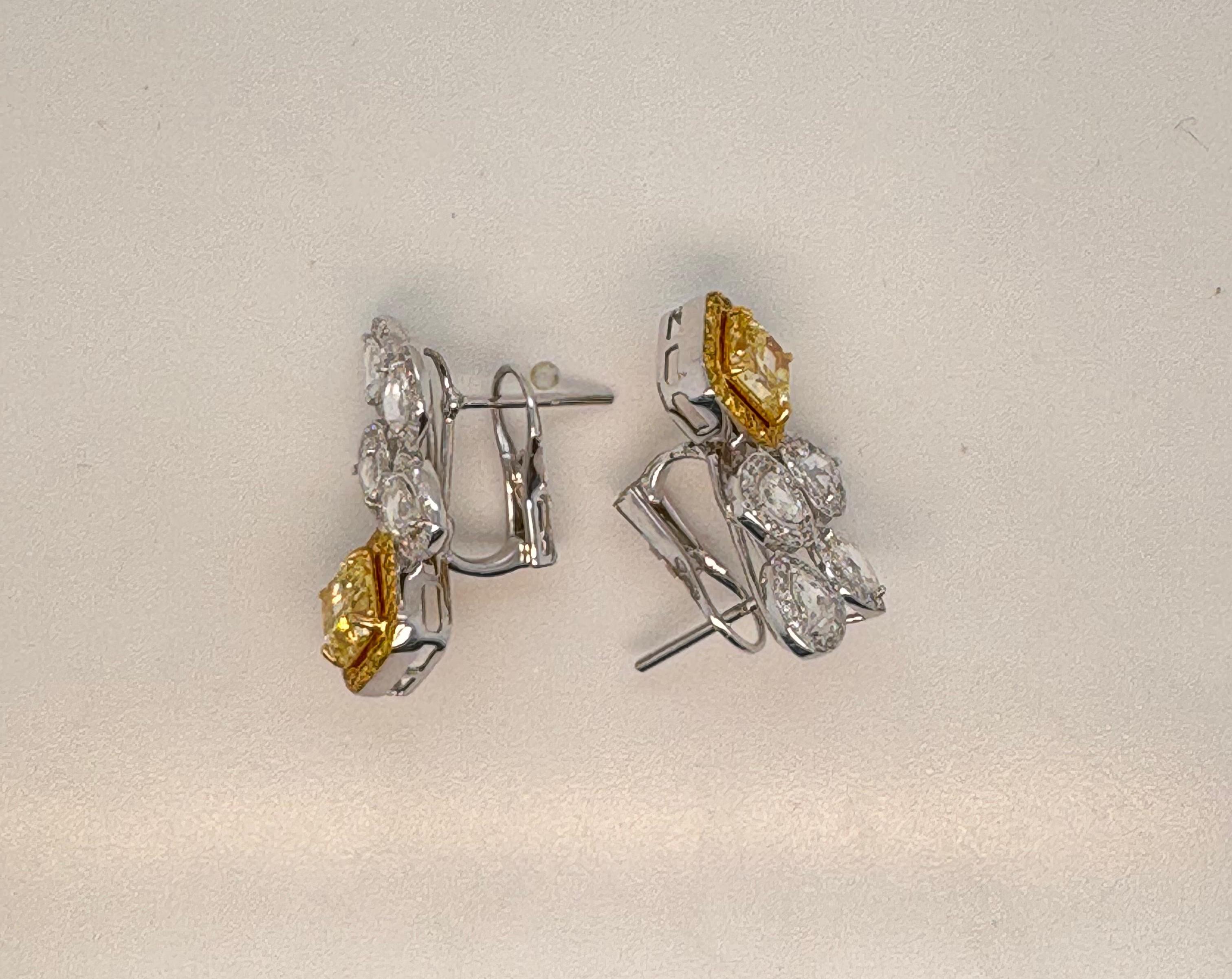 Cushion Cut GIA Certified 2.87 Carats Fancy Yellow Diamond Earrings in 18k White Gold For Sale