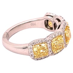 GIA Certified 2.87 Fancy Vivid Yellow Graduating Cushion Cut Multi Stone Band