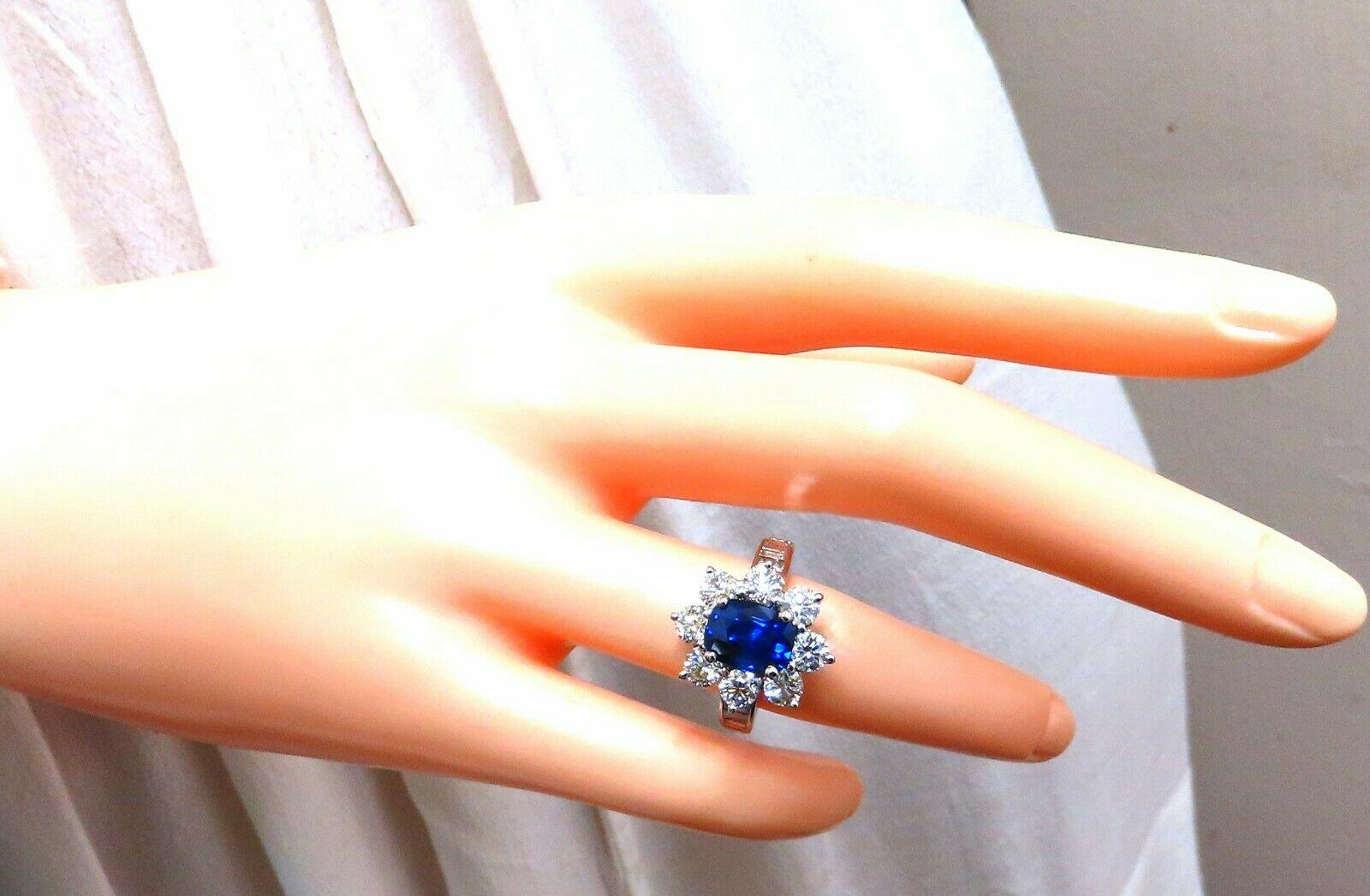 No heat Classic Halo Cluster

GIA Certified 

2.87ct. Natural No heat Blue Sapphire ring.

Report:  6204463618

Cushion cut: 8.79 x 6.77 x 5.29mm

Clean (VS) Clarity, Transparent

Even Royal Blue



1.94ct. Side natural Round diamonds

G color, Vs-2