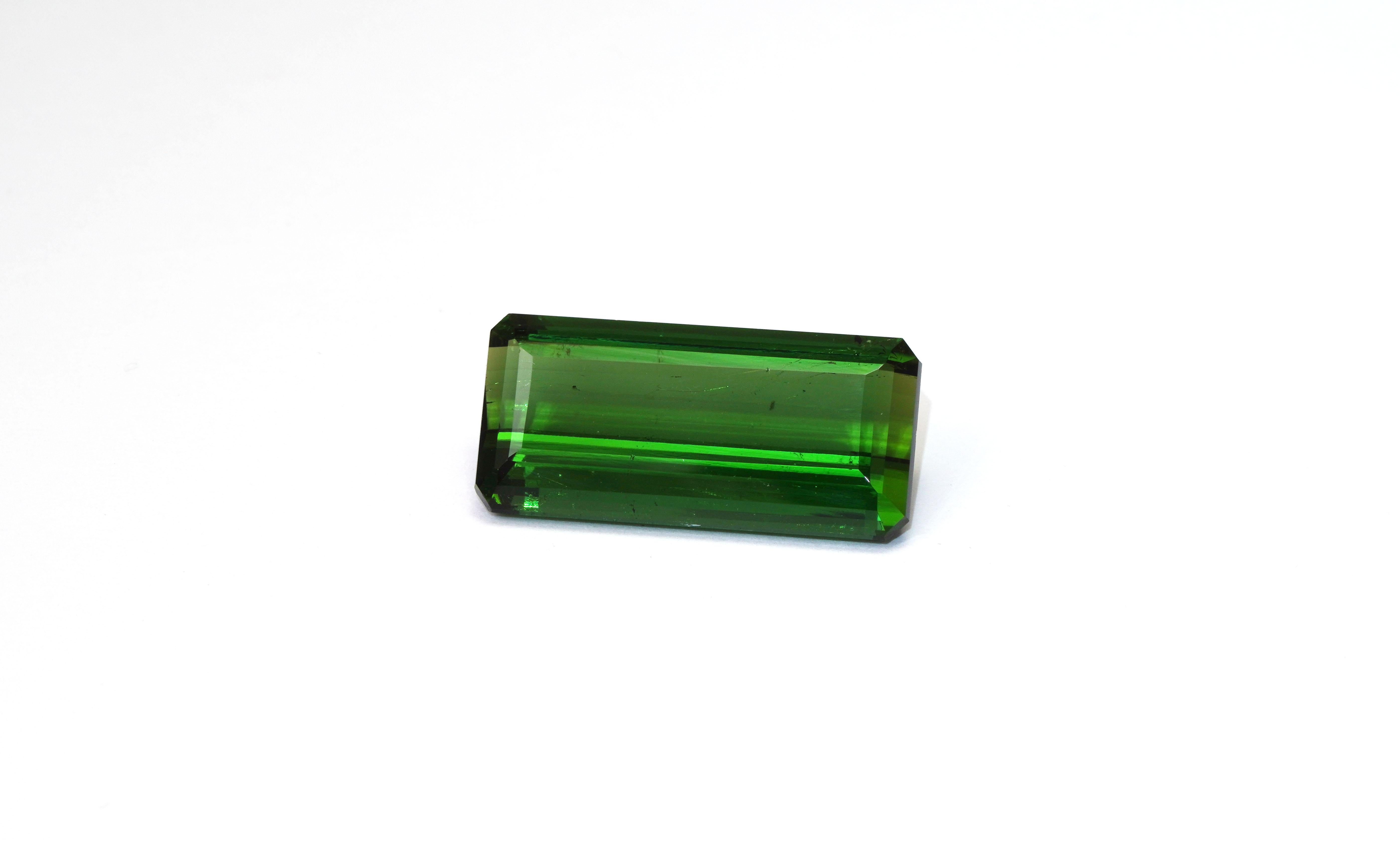 GIA Certified 28.91 Carat Tourmaline
Measurements: 27.52 x 13.14 x 8.40 mm
Weight: 28.91 Carat
Cut: Step Cut
Color: Yellowish Green
No indications of Heating 
Certificate number: 5202536116