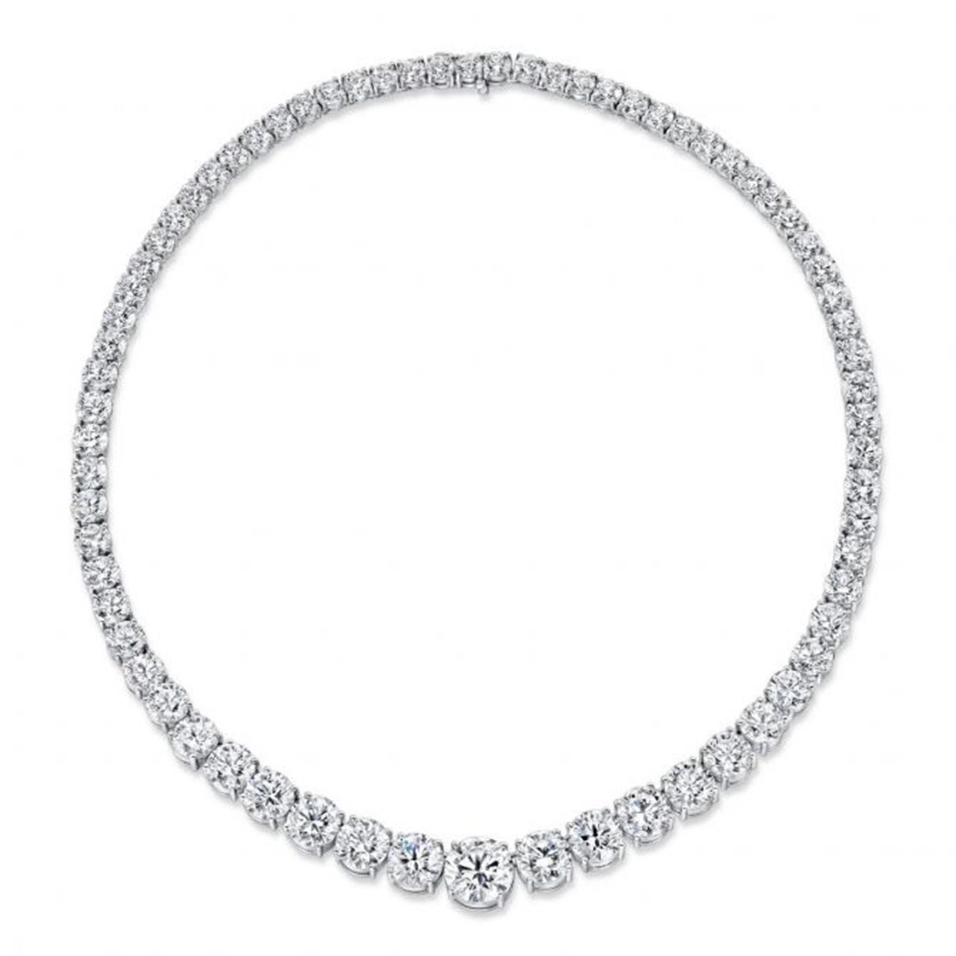 Behold the epitome of luxury and refinement with our mesmerizing 2.00 carat center FG FL-VS Riviera Necklace. Crafted to perfection, this masterpiece boasts a total carat weight of 29 carat set in radiant platinum. 

With a captivating 16.00-inch