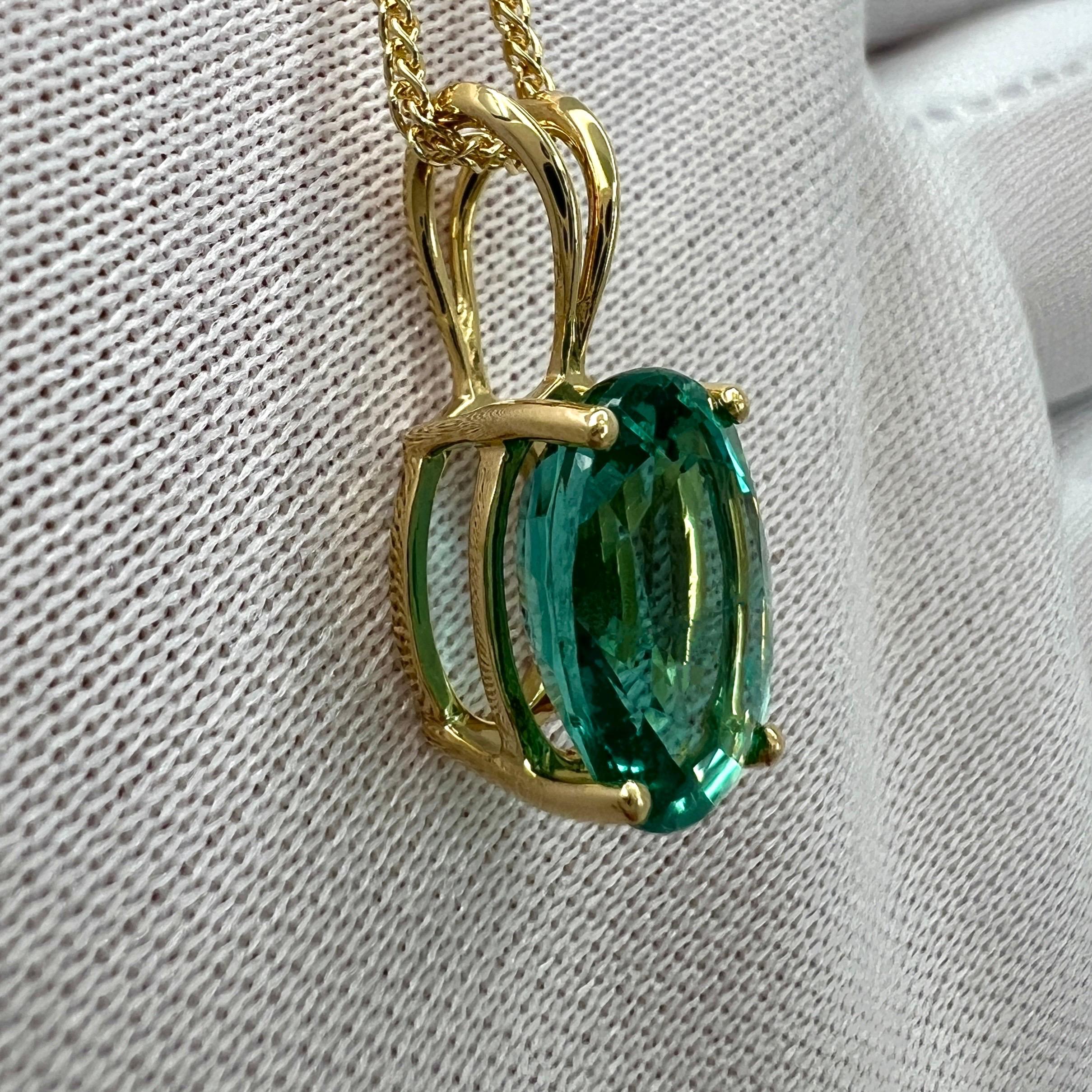 GIA Certified 2.95ct Vivid Blue Green Oval Cut Emerald 18k Gold Pendant Necklace For Sale 3