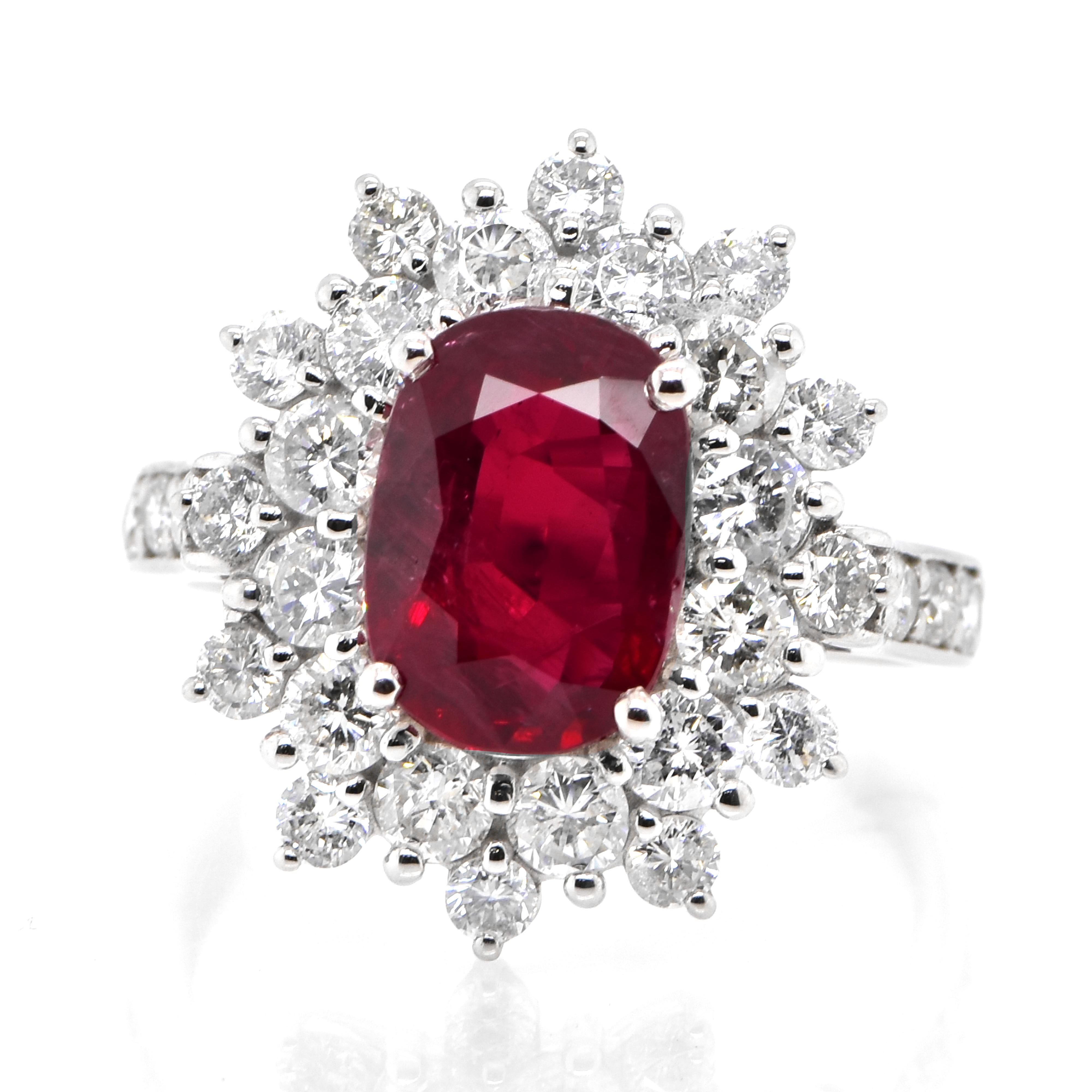 A beautiful Ring set in Platinum featuring a GIA Certified 2.97 Carat Natural Siam (Thailand) Ruby and 1.73 Carat Diamonds. Rubies are referred to as 