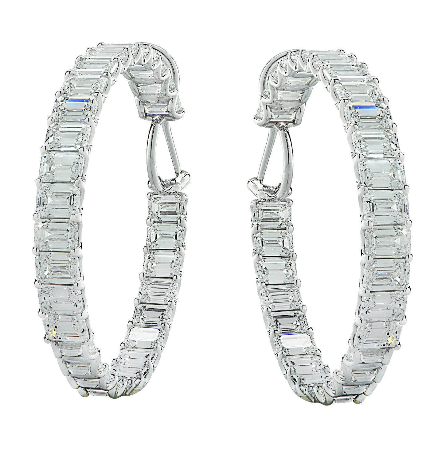 Spectacular in/out round hoop earrings, crafted in platinum, showcasing 62 GIA Certified emerald cut diamonds weighing 29.77 carats total, D-F color, IF-VS2 clarity. The diamonds are set in the inside and outside of the hoops, creating a sensational