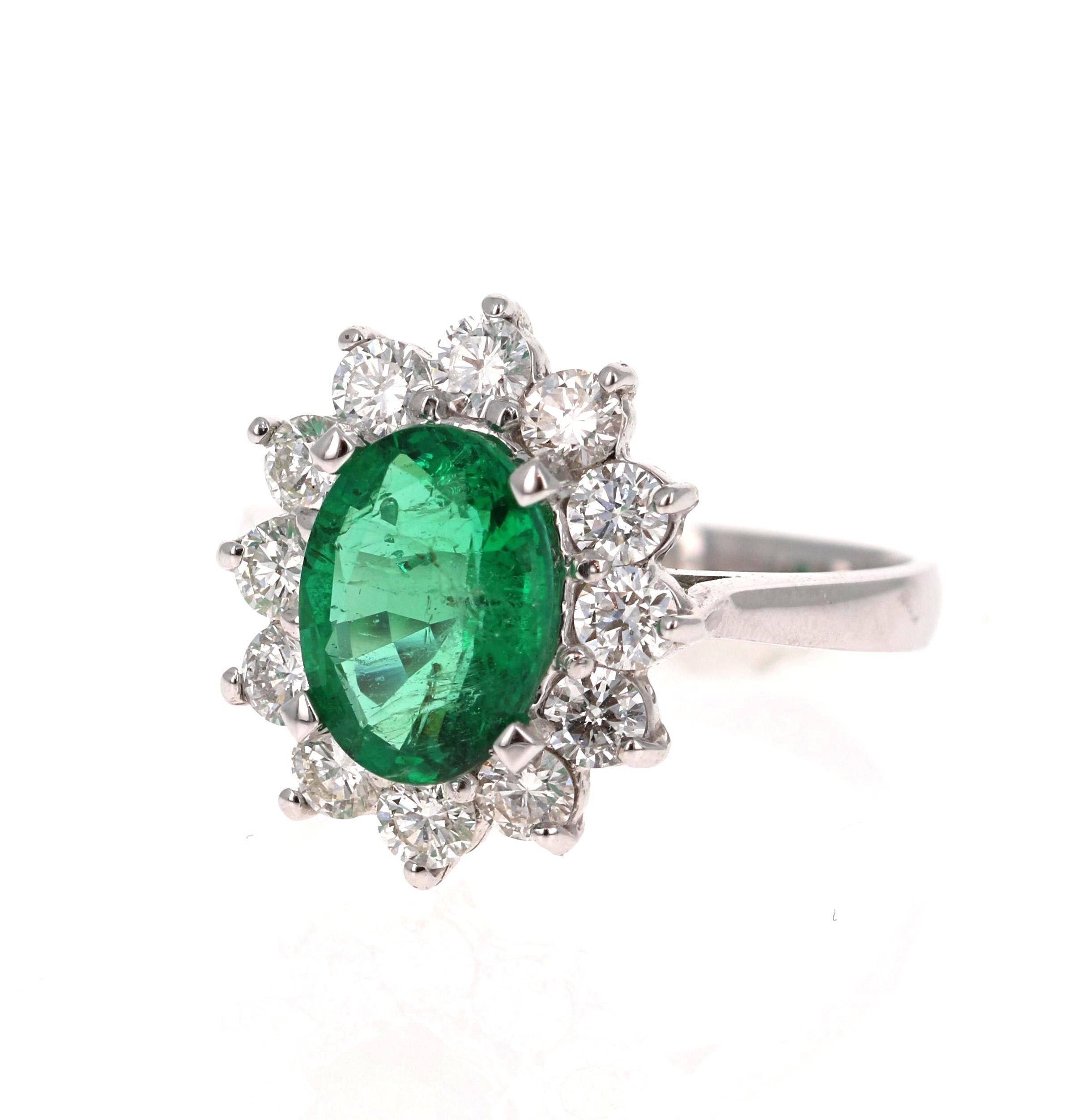 Exquisite Ballerina Style 2.99 Carat Emerald and Diamond Ring in 18K White Gold.
This gorgeous ring has a 1.94 Carat Oval Cut Emerald and is GIA Certified. (Cert #: 2215048715) The Emerald is surrounded by 12 Round Cut Diamonds that weigh 1.05