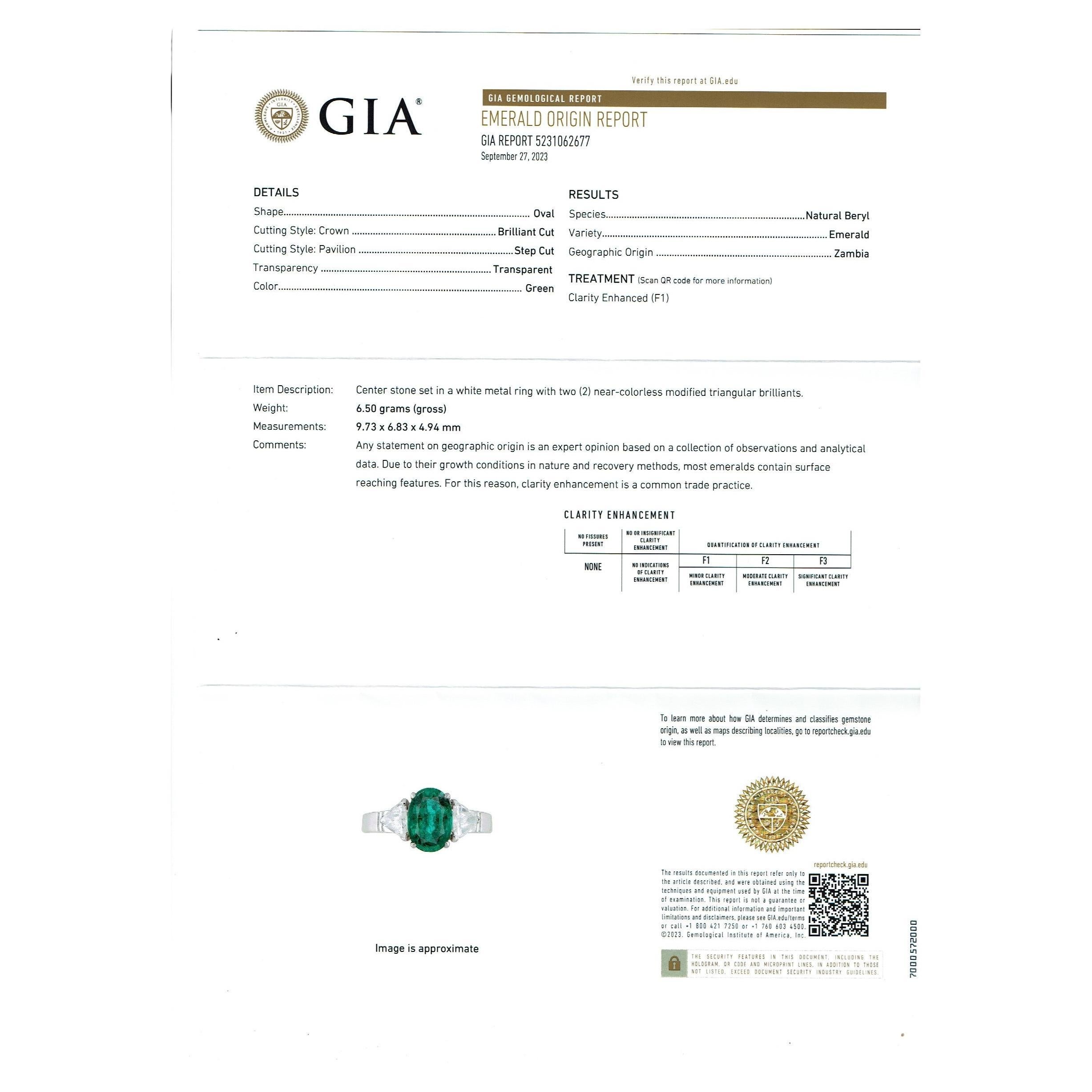 GIA Certified 2Ct Fine Zambian Emerald & 1.02 Ct Total Trillion Diamond Ring in platinum
A classic, cocktail  / Engagement ring 
GIA Certified approximately 2 Ct Fine Oval Zambian Emerald & 1.5 Ct total  Trillion Diamond Ring in 18 Karat White