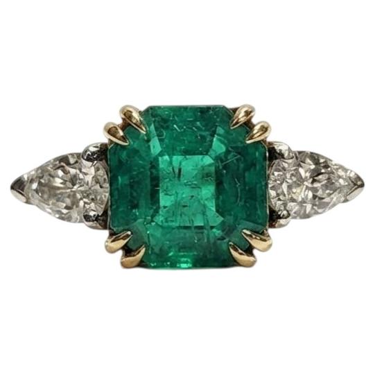 GIA Certified 3 Carat Colombian Emerald Three-Stone Cocktail Ring For Sale