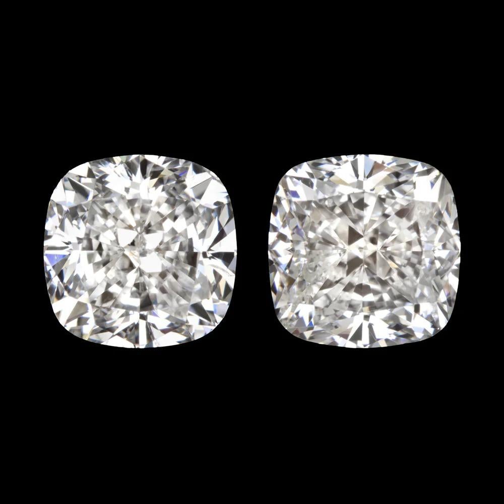 Large 3.02ct diamond pair

- Both GIA certified

- Bright white G color

- Eye clean with SI2 clarity

- Square cushion cuts

- Fantastic sparkle and brilliance!