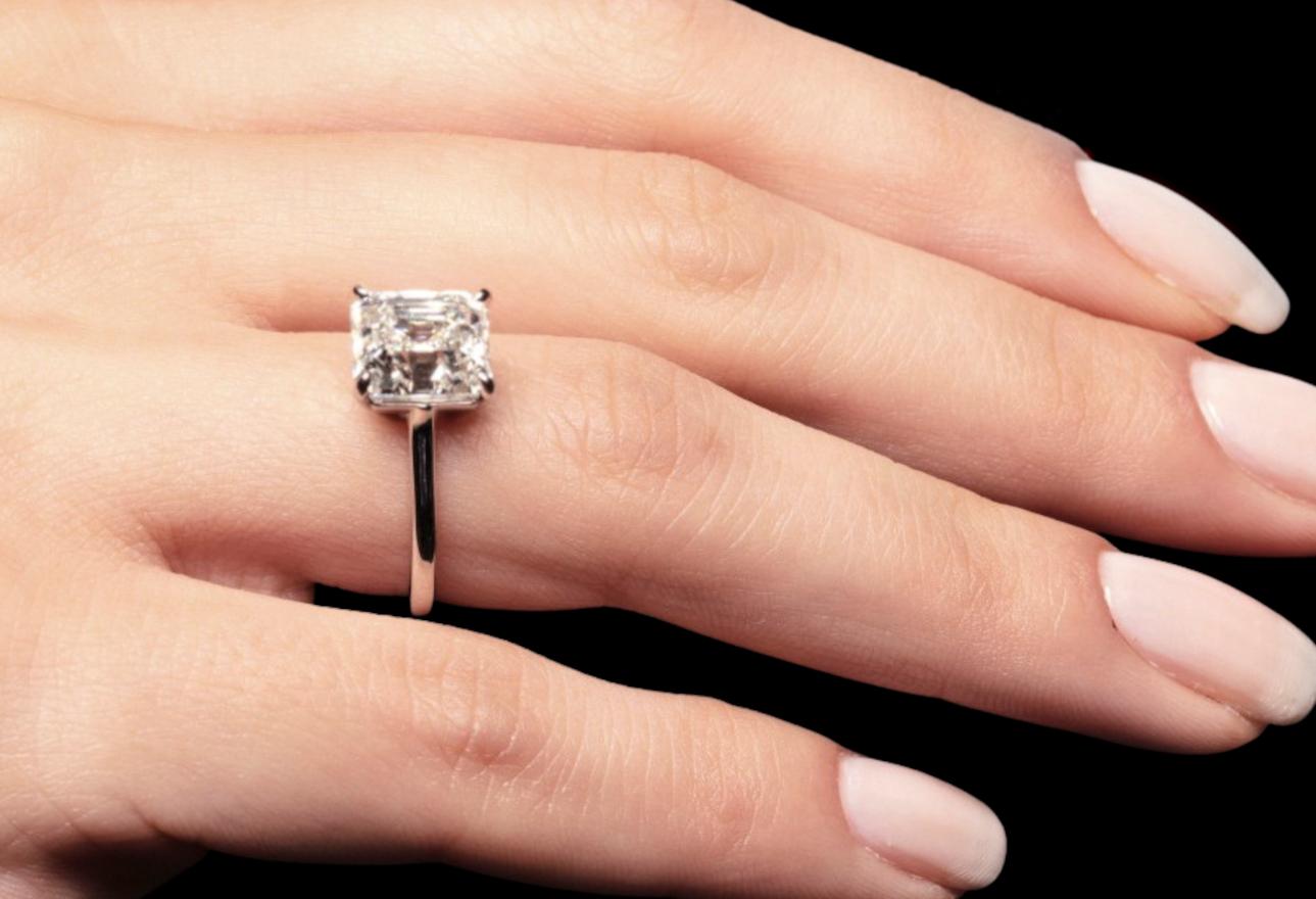 Modern GIA Certified 3 Carat E Color Square Emerald Cut Diamond Platinum Ring For Sale