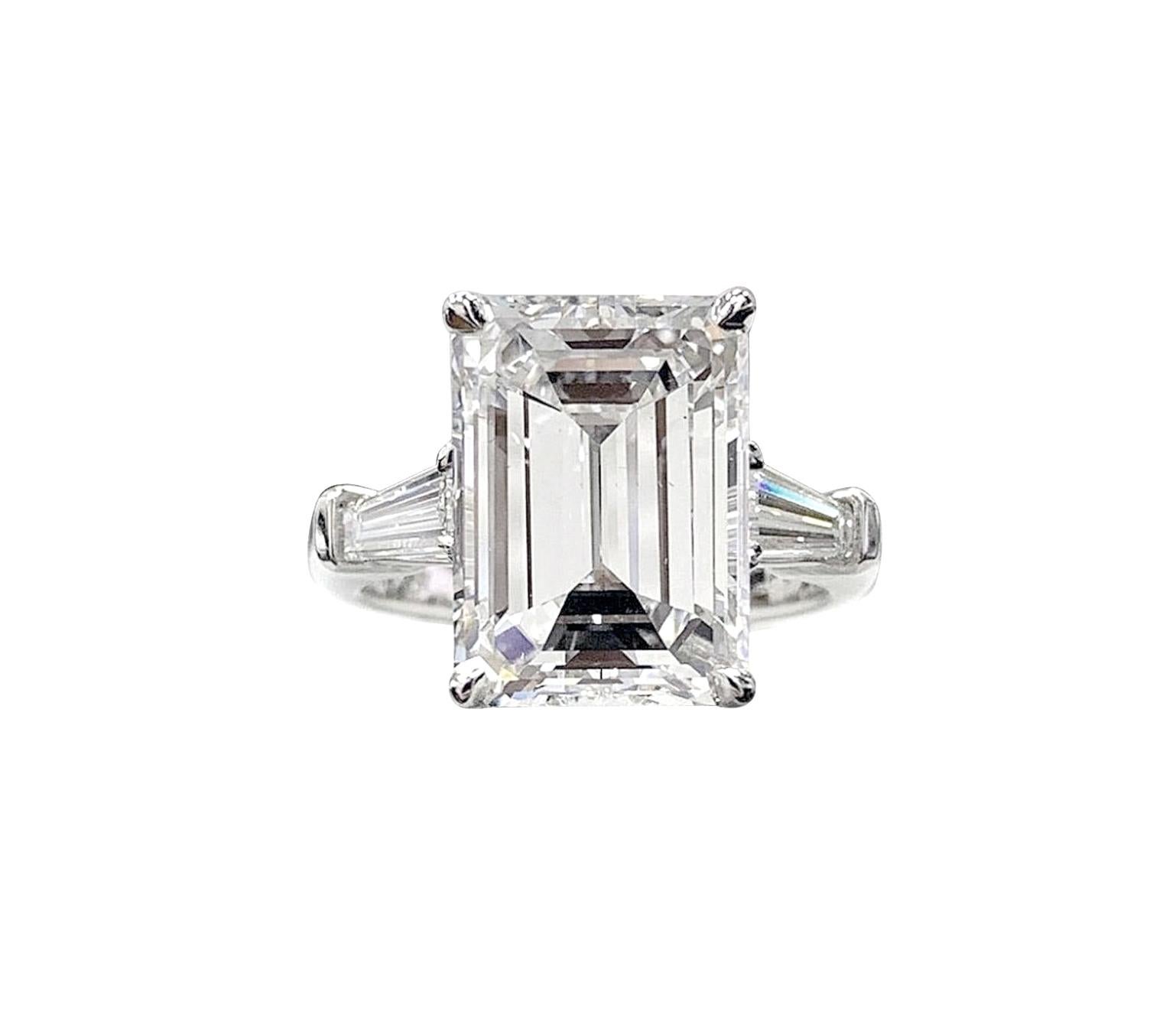 Elevate your love story with this enchanting GIA Certified 3 Carat Emerald Cut Diamond Ring, a true testament to sophistication and timeless beauty. The centerpiece of this exquisite ring is a GIA-certified 3-carat emerald cut diamond, renowned for