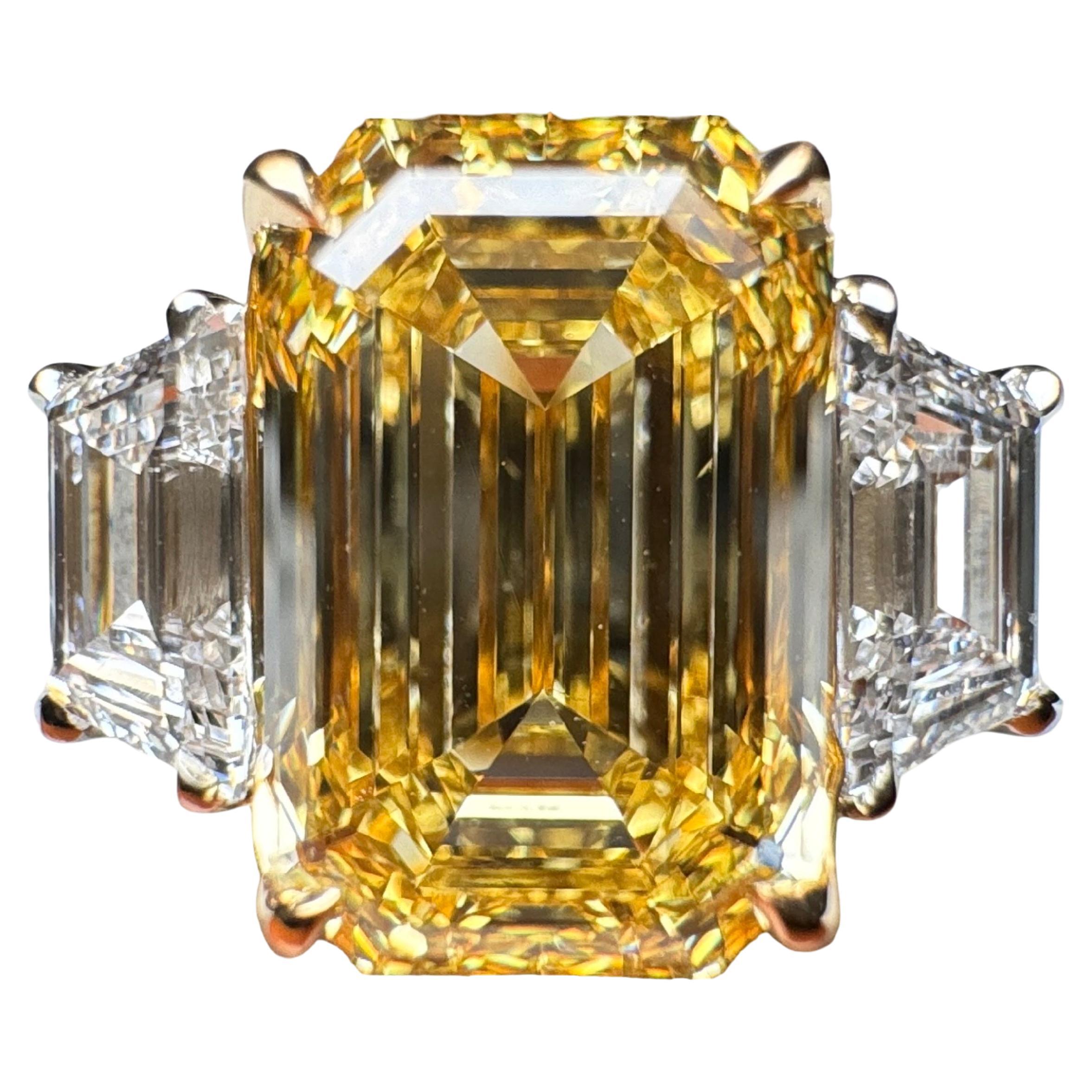 GIA Certified 3 Carat Emerald Cut Fancy Intense Yellow Diamond Three Stone Ring