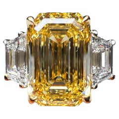 GIA Certified 3 Carat Emerald Cut Fancy Intense Yellow Diamond Three Stone Ring