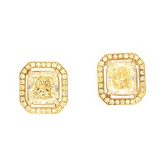 GIA Certified 3 Carat Fancy Light Yellow Diamond Radiant Cut Stud Earrings