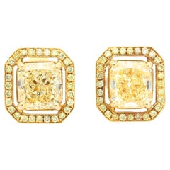 GIA Certified 3 Carat Fancy Light Yellow Diamond Radiant Cut Stud Earrings