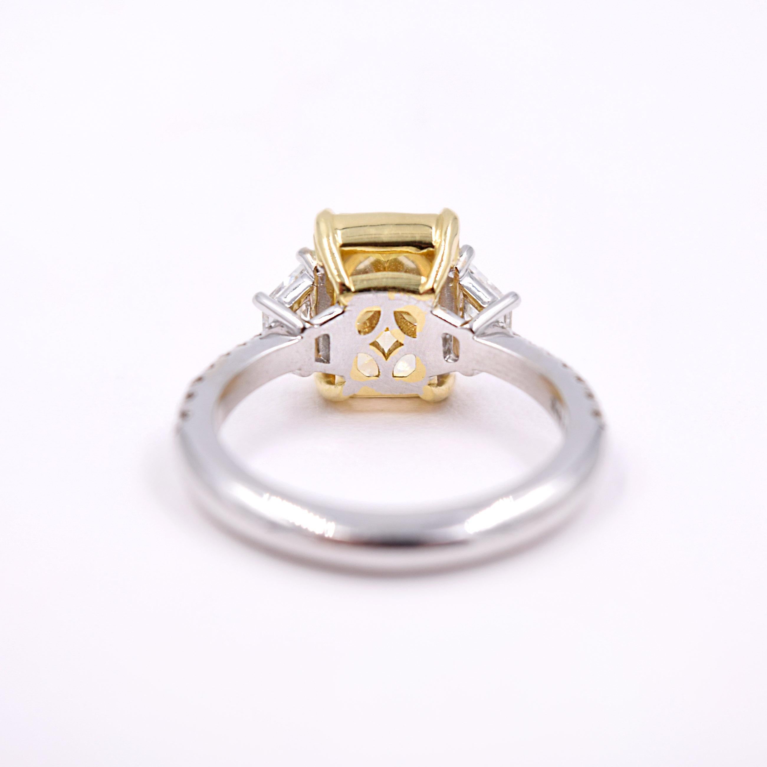 Contemporary GIA Certified 3 Carat Fancy Yellow Diamond Ring in 18K White and Yellow Gold For Sale