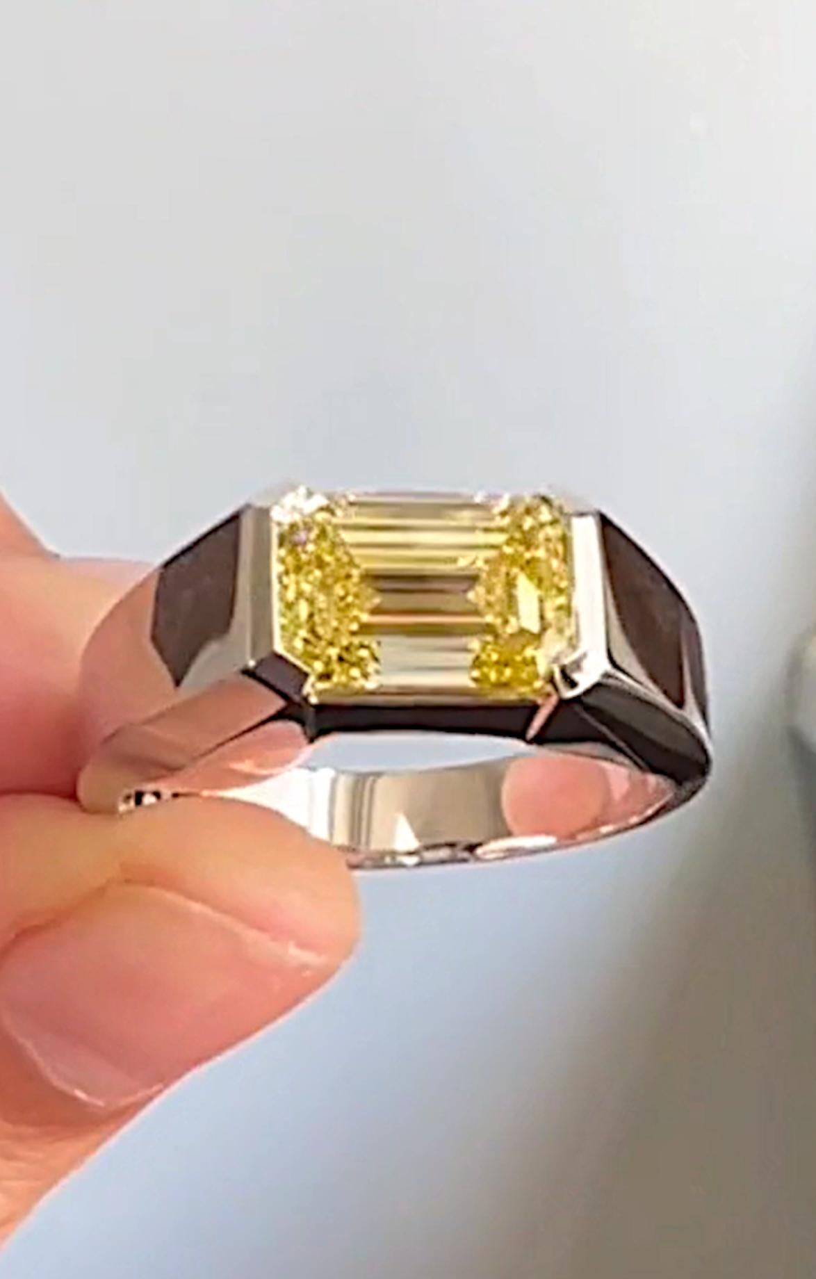 An exquisite emerald cut diamond mounted in solid platinum 
the main stone weight is 3 carats



