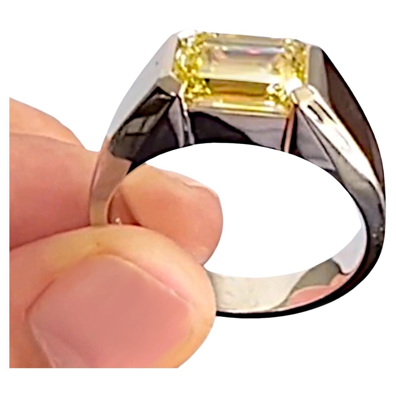 GIA Certified 3 Carat Fancy Yellow Emerald Cut Band Ring For Sale