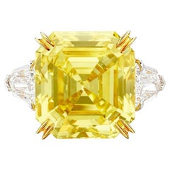 Anello in platino con diamante giallo fantasia taglio smeraldo da 3 carati certificato GIA