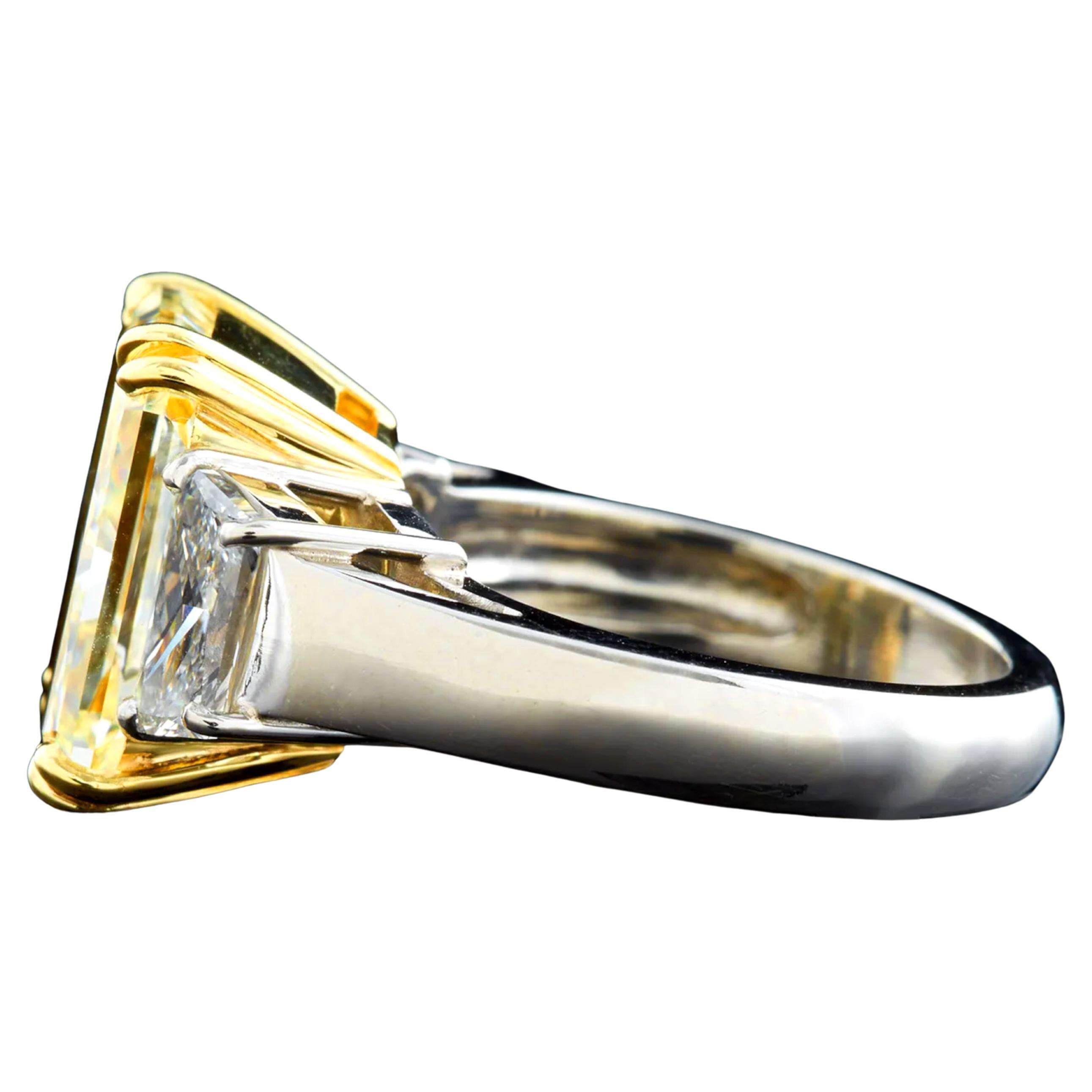 A masterpiece of timeless elegance, this estate diamond ring showcases a breathtaking GIA-certified 3-carat radiant cut diamond. With its fancy yelllow color and VS1 clarity, this diamond radiates exceptional brilliance while maintaining a refined,
