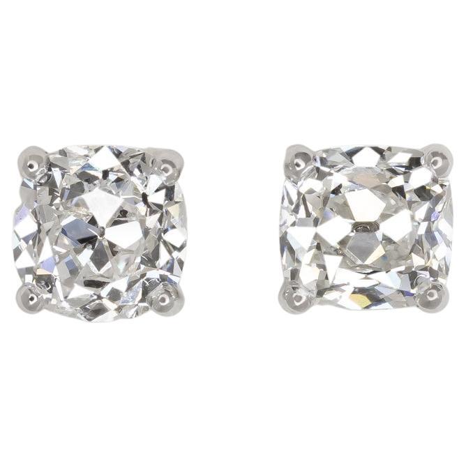 an exquisite pair of GIA certified 3 carat old mine cut cushion diamond platinum studs
full of brightness