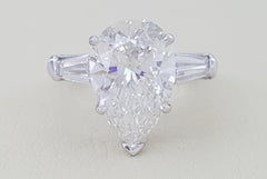 GIA Certified 3.01 Carat Pear Cut Diamond Engagement Ring with tapered baguette