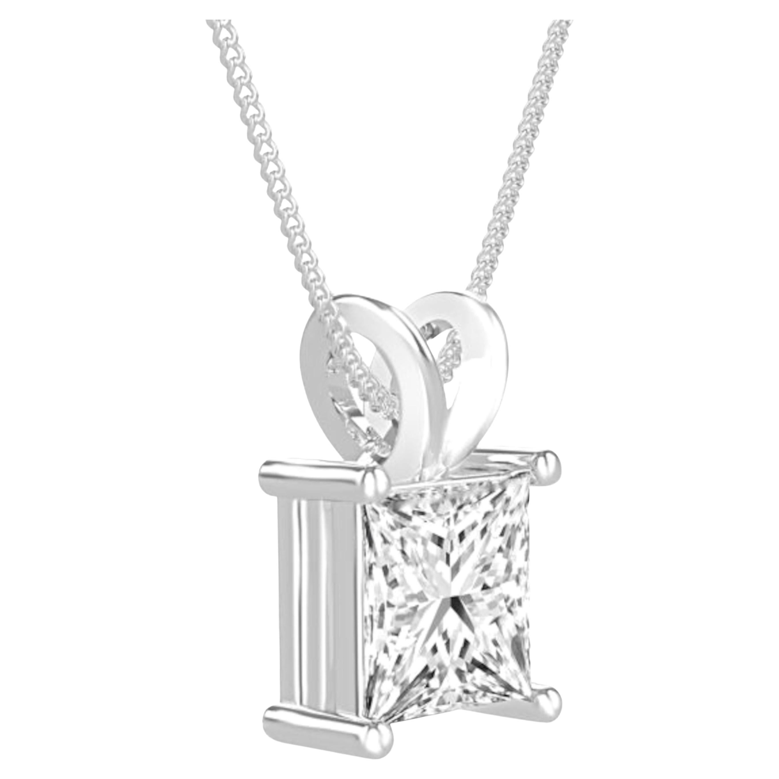 This elegant pendant showcases a GIA-certified 3.02-carat princess-cut diamond as the centerpiece. Crafted in 14K white gold, the pendant combines classic design with modern sophistication. The diamond features the following impressive