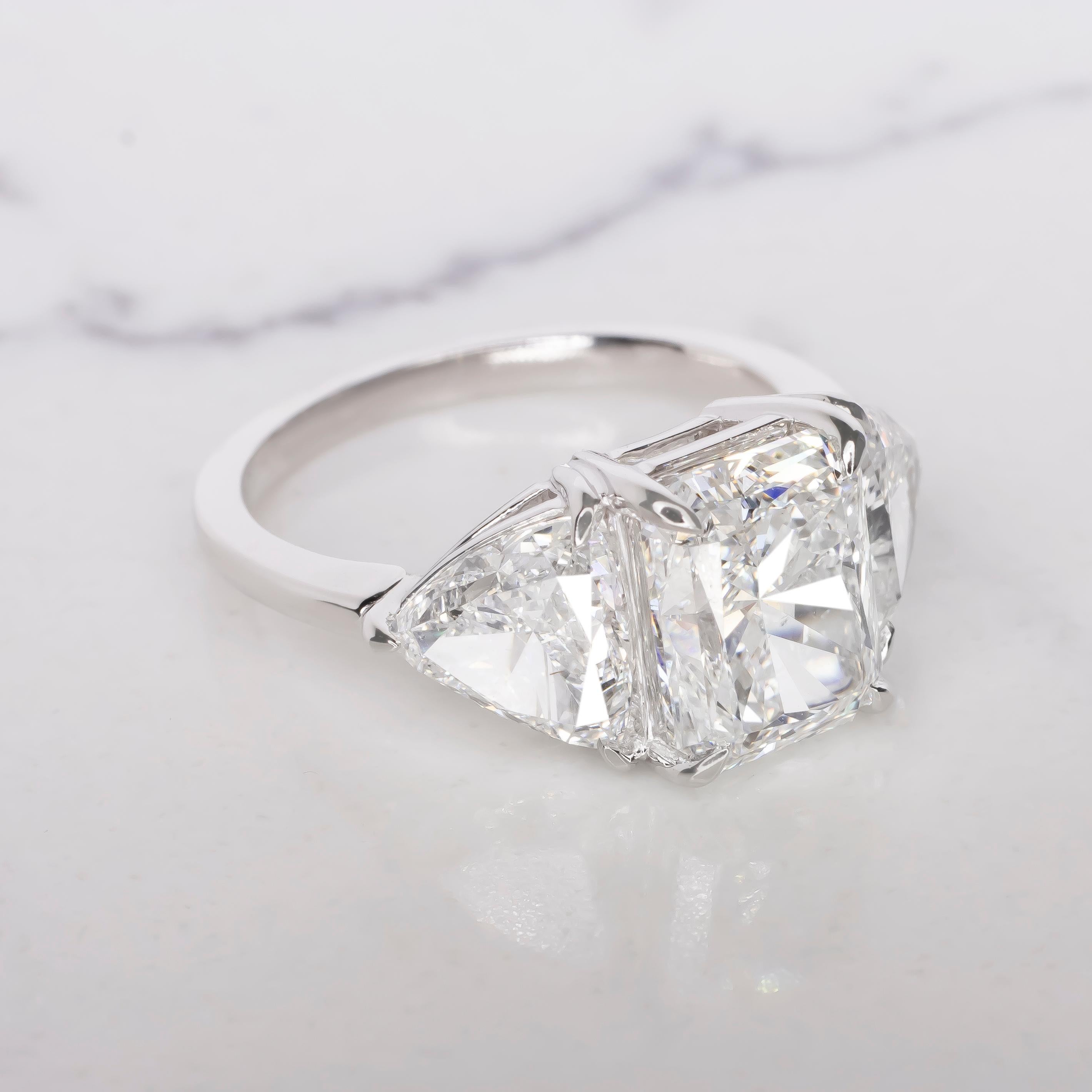 Contemporary GIA Certified 3.01 Carat Radiant Cut Diamond E Color with Trillion Diamonds For Sale