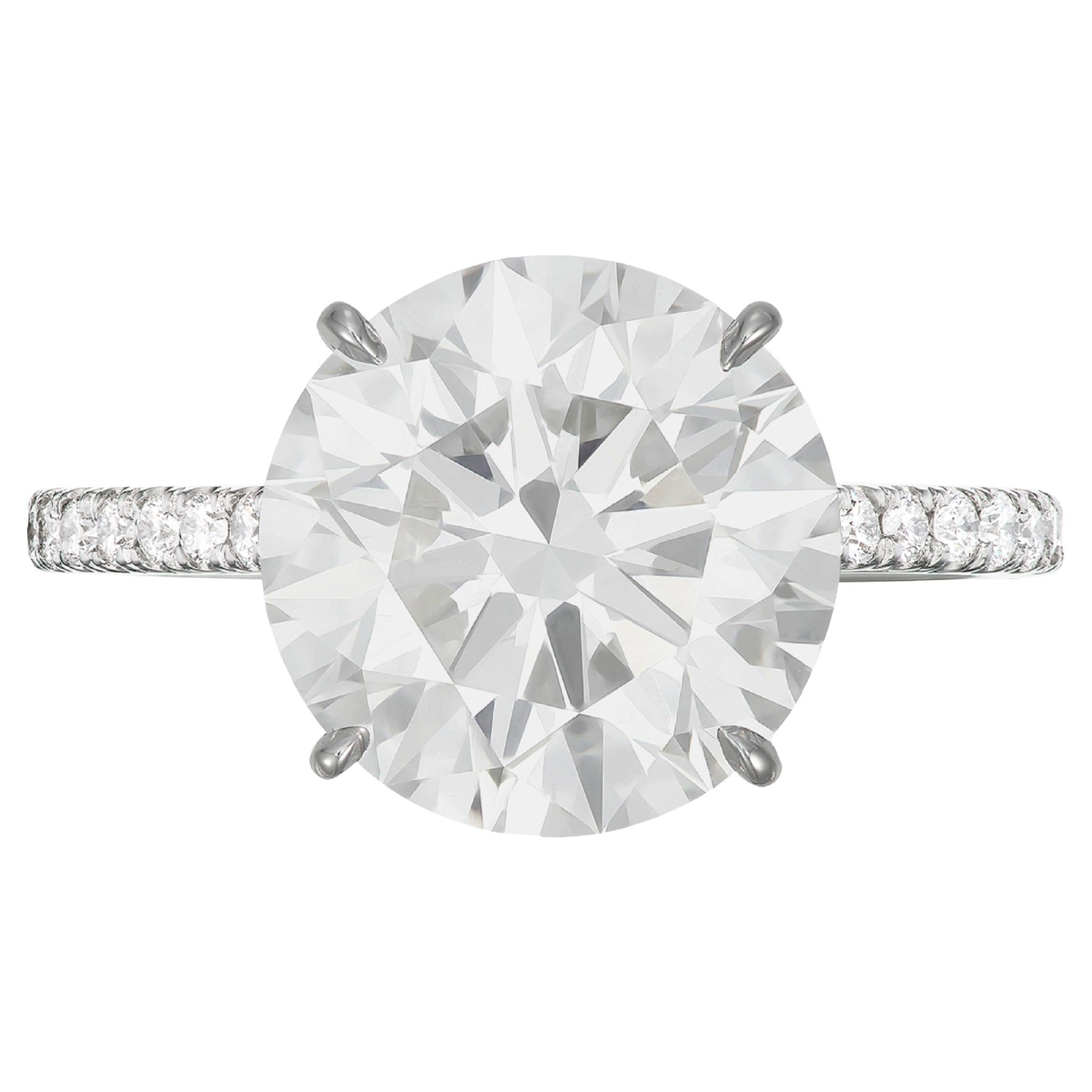An exquisite investment grade 3.01 carat round brilliant cut diamond set with a micropave of round diamonds in solid platinum
3 excellent cut
F Color
Internally Flawless Clarity
Fluorescence: None

a truly magnificent jewel