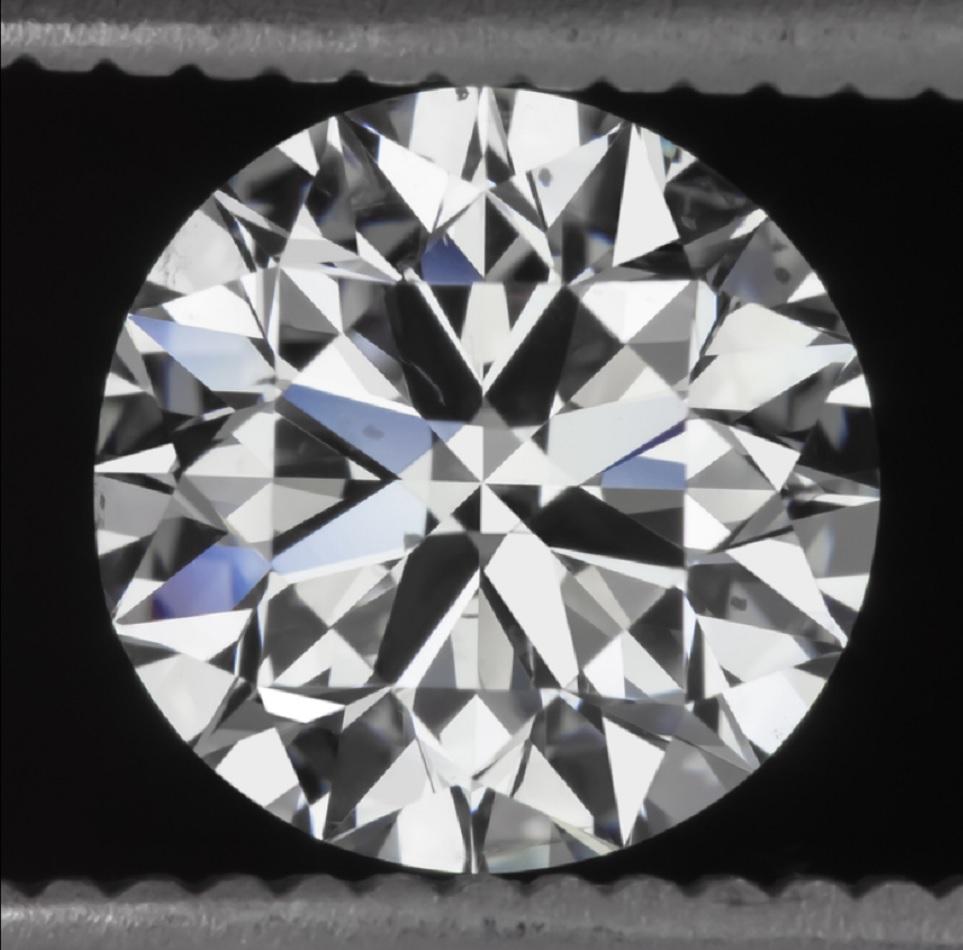 This dazzling and impressively large 3.02 carat GIA certified diamond is colorless, 100% clean, and displays absolutely phenomenal sparkle! 

This round brilliant cut diamond is certified by GIA, the world’s premier gemological authority. Under