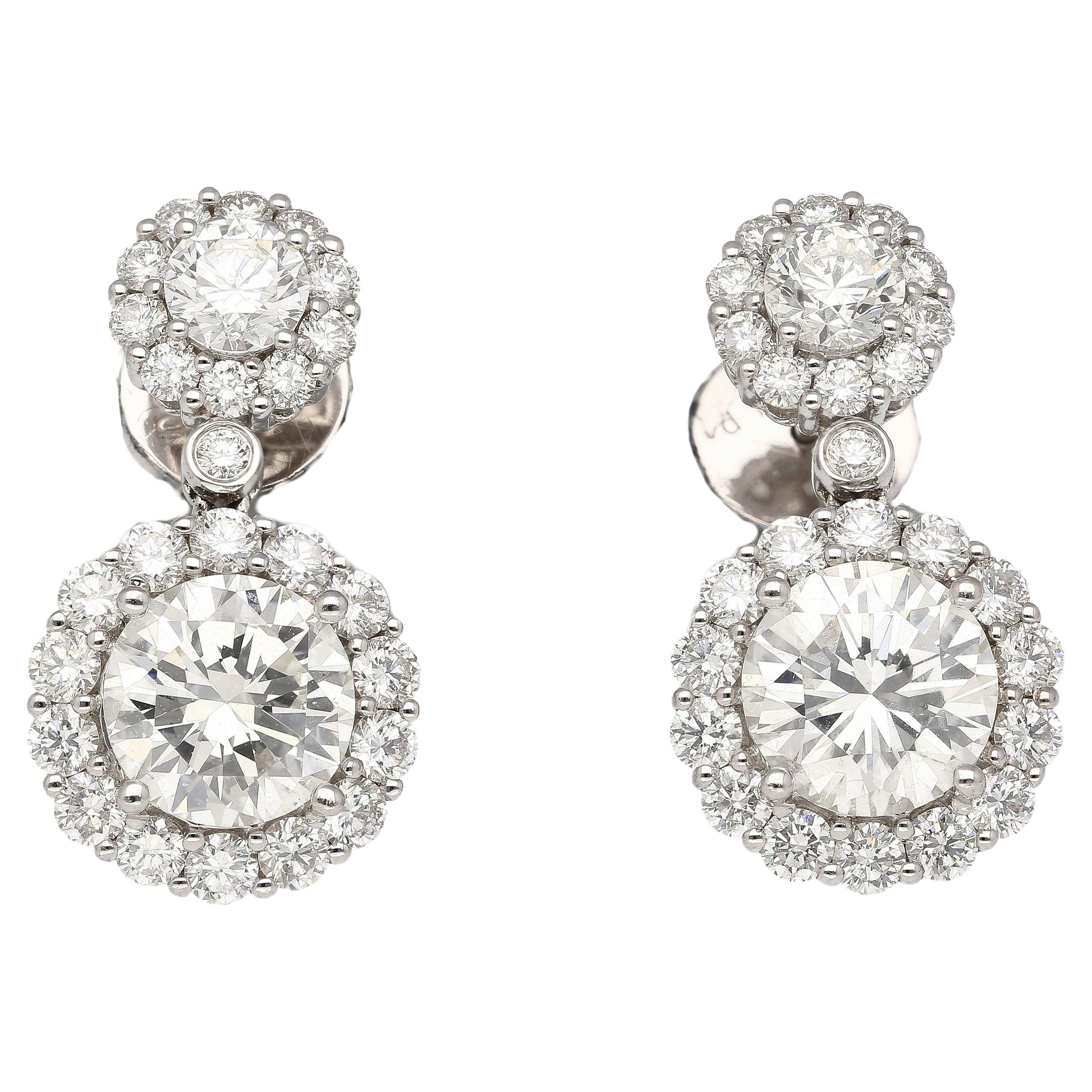 GIA Certified 3 Carat Round Cut 2-Stone Diamond Drop Earrings For Sale