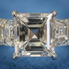 GIA Certified 3 Carat Step Cut Diamond Three-Stone Platinum Engagement Ring