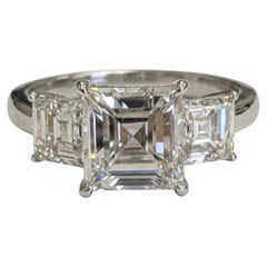 GIA Certified 3 Carat Step Cut Diamond Three-Stone Platinum Engagement Ring