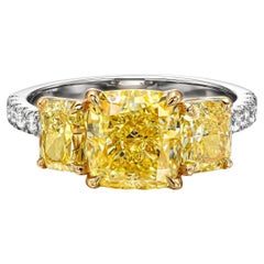 GIA certified 3 stone fancy intense yellow diamond cocktail ring