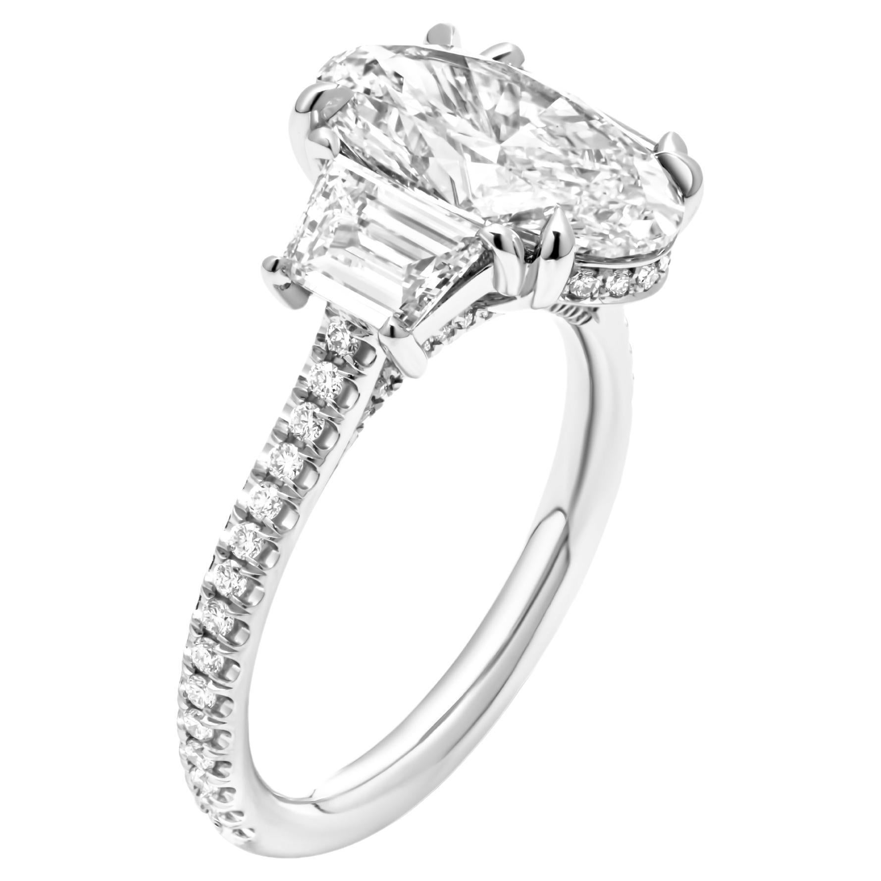 GIA Certified 3 stone ring with 3.01ct I VVS2 Oval Diamond For Sale