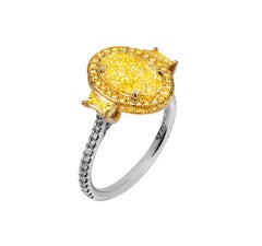 Bague à 3 pierres certifiée GIA avec diamant ovale jaune fantaisie VVS2 de 3,33 carats