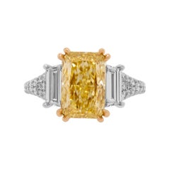 GIA Certified 3 Stone Ring with 3.34ct Fancy Yellow VVS2 Radiant Cut