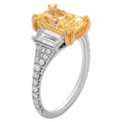 GIA Certified 3 Stone Ring with 3.34ct Fancy Yellow VVS2 Radiant Cut