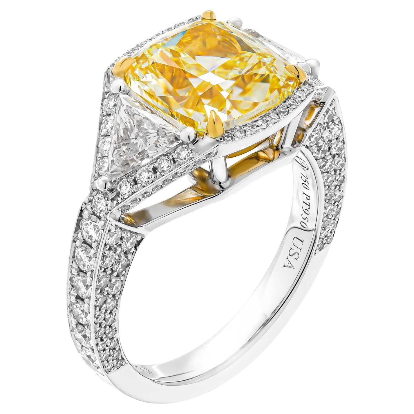 GIA Certified 3-Stone Ring with 4.01 Carat Fancy Light Yellow Diamond For Sale
