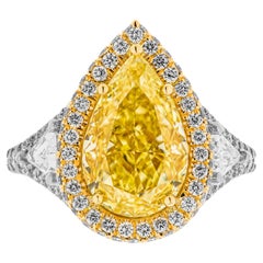 GIA Certified 3-Stone Ring with 4.02ct Fancy Yellow VS2 Pear Shape