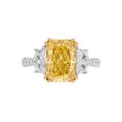 GIA Certified 3-Stone Ring with 4.02ct Fancy Yellow VVS2 Radiant Cut