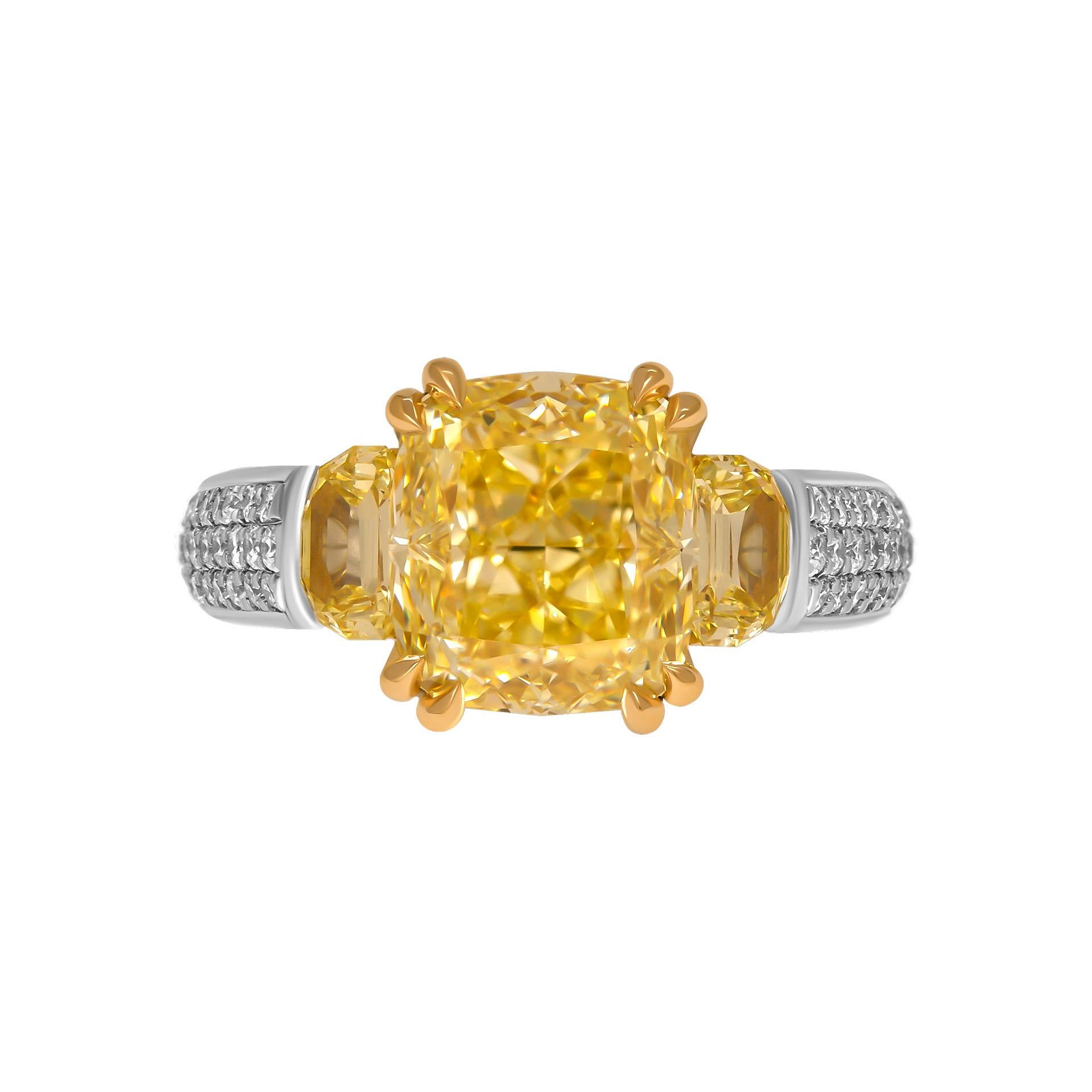 3 stone ring in Platinum & 18K Yellow Gold

Center: 4.04ct Natural Fancy Yellow Even VVS2 Cushion Shape Diamond GIA#2223222634 

Two side half-moons shapes diamond:
                                                               0.27ct Fancy Intense